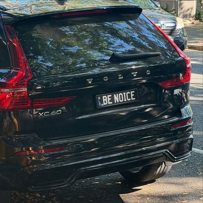 Black Volvo XC60 with a personalized license plate reading BE NOICE, an example of hilarious personalized license plates.