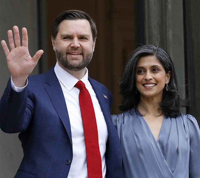 JD Vance and wife Usha smiling together outside a building amid public speculation about their marriage. JD Vance and wife Usha smiling together outside a building amid public speculation about their marriage.