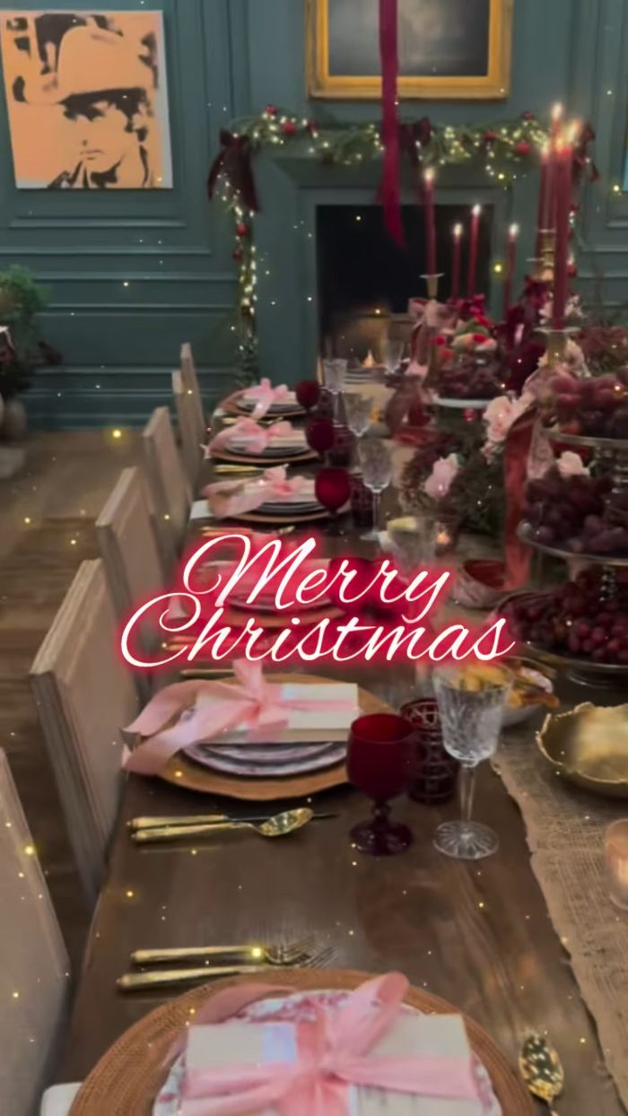 Festive Christmas dining table set with elegant decor and soft lighting, highlighting an odd detail in Jennifer Lopez&rsquo;s photo.