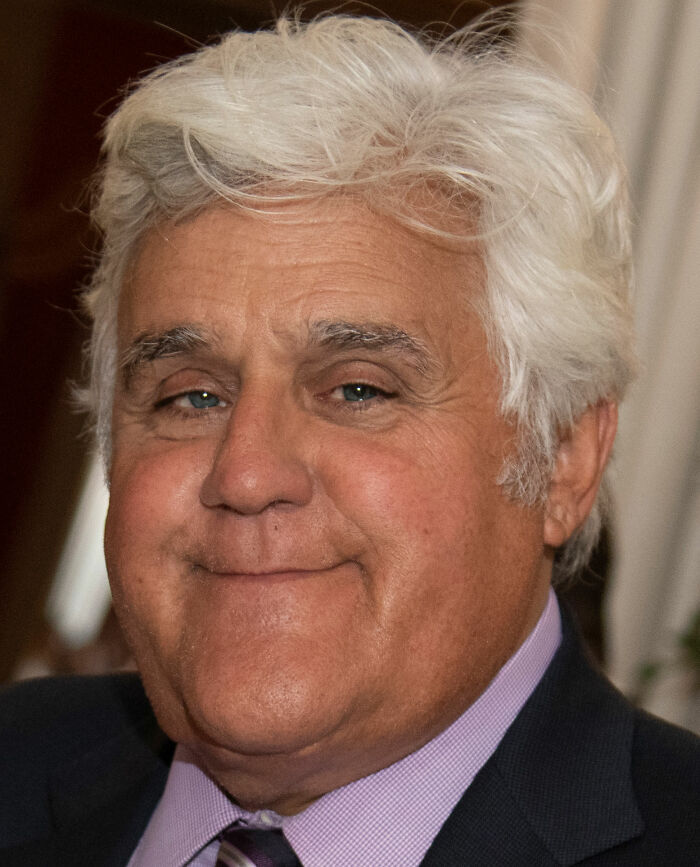 Close-up of an older man with white hair and a suit, related to banned stars from the Tonight Show by Johnny Carson. Close-up of an older man with white hair and a suit, related to banned stars from the Tonight Show by Johnny Carson.