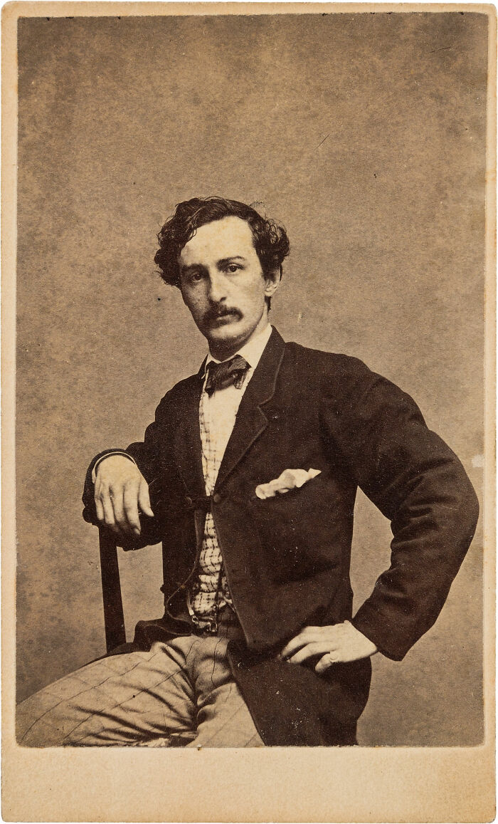 Vintage portrait of a man seated and dressed in 19th-century attire, illustrating people share historical facts unknown until recently.