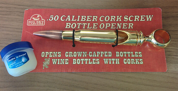 .50 caliber cork s***w bottle opener designed as a bullet, one of hilariously bad Secret Santa gifts received alongside lip balm.