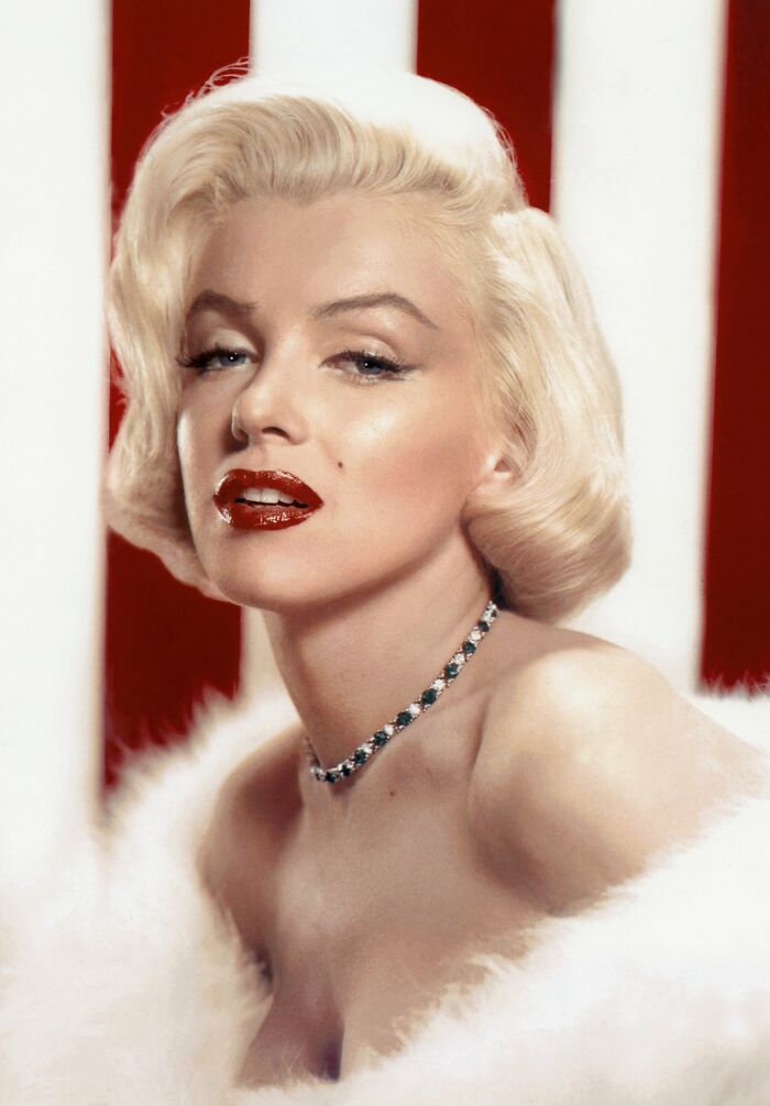 Classic portrait of a glamorous woman with platinum blonde hair and red lipstick, featured in crazy facts shared online.