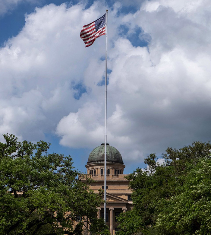 American flag flying above government building symbolizing mom of late cheerleader challenging cops' ruling after phone clue discovery American flag flying above government building symbolizing mom of late cheerleader challenging cops' ruling after phone clue discovery