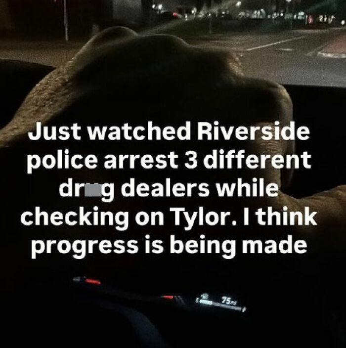 Hand holding steering wheel at night with text about Riverside police arresting d**g dealers while checking on Tylor’s hospitalization progress. Hand holding steering wheel at night with text about Riverside police arresting d**g dealers while checking on Tylor’s hospitalization progress.