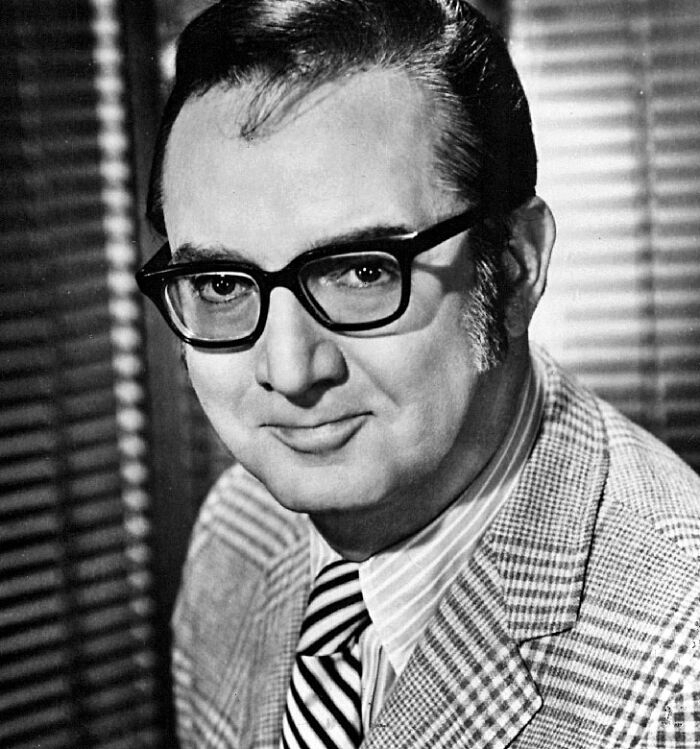 Black and white portrait of a man in glasses and a plaid suit, related to banned stars from the Tonight Show Johnny Carson. Black and white portrait of a man in glasses and a plaid suit, related to banned stars from the Tonight Show Johnny Carson.