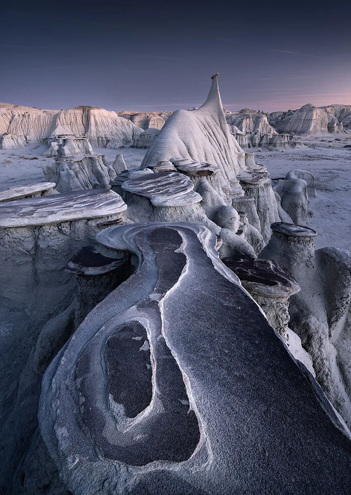 Unique rock formations in a desert landscape showcasing the best nature photography from international photo awards 2025 winners