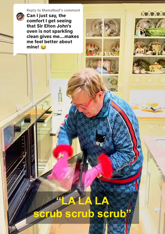 Elton John cleaning oven in kitchen wearing gloves, responding to fan comments about kitchen details and cleanliness. Elton John cleaning oven in kitchen wearing gloves, responding to fan comments about kitchen details and cleanliness.