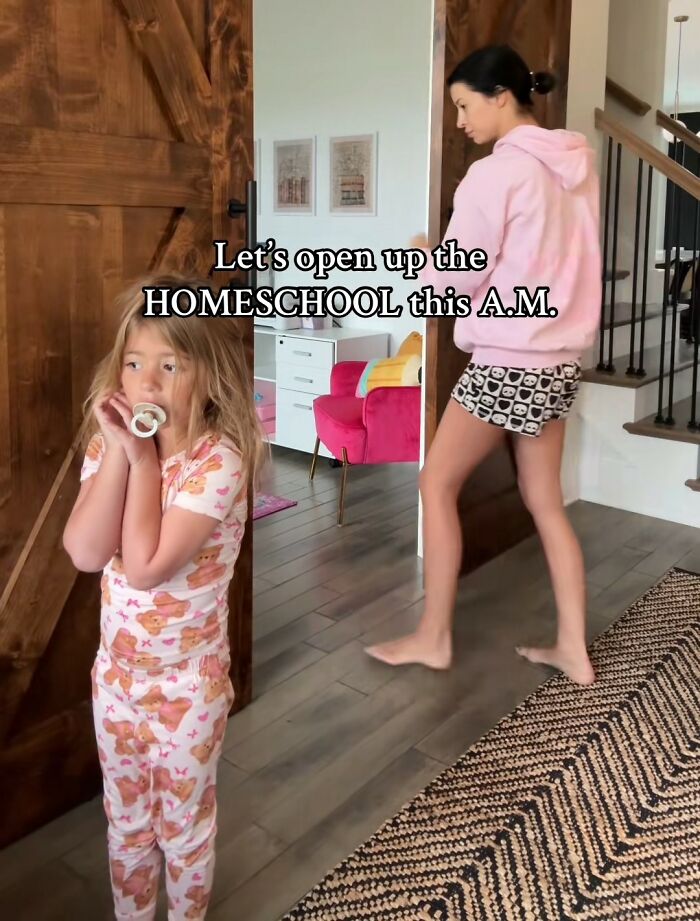 Young child with pacifier standing by door while woman in casual clothes walks inside, illustrating viral homeschool clip.