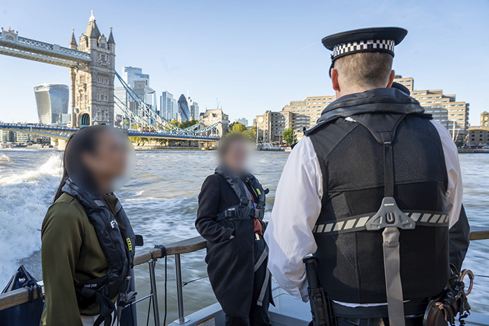 Police officers on a boat near Tower Bridge investigating behavior of a wealthy US student after altercation incident Police officers on a boat near Tower Bridge investigating behavior of a wealthy US student after altercation incident