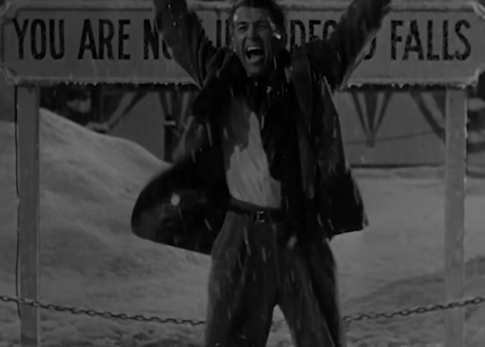 Man celebrating in snow in a crucial scene from a beloved Christmas classic criticized by Amazon Prime for cutting. Man celebrating in snow in a crucial scene from a beloved Christmas classic criticized by Amazon Prime for cutting.
