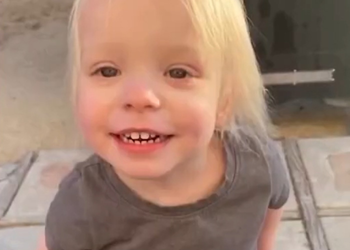 Young blonde toddler smiling outdoors, related to mom's chilling Google searches in case of 5-year-old daughter's slaying. Young blonde toddler smiling outdoors, related to mom's chilling Google searches in case of 5-year-old daughter's slaying.