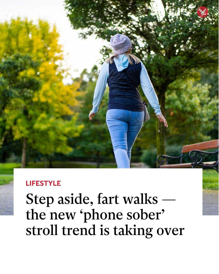 Woman walking in a park illustrating local newspaper titles showing unusual world news trends and lifestyle stories.