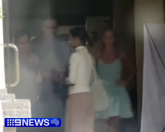 Blurry image showing people leaving a building with 9NEWS logo, related to Annie Knight and Bonnie Blue arrest news. Blurry image showing people leaving a building with 9NEWS logo, related to Annie Knight and Bonnie Blue arrest news.