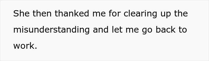 A man taking a call in Korean at work while a black coworker looks upset and prepares to involve HR.