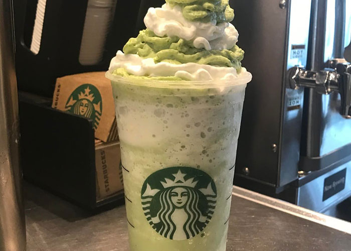 Starbucks matcha frappuccino with whipped cream on top, revealing industry secrets customers never knew about jobs.