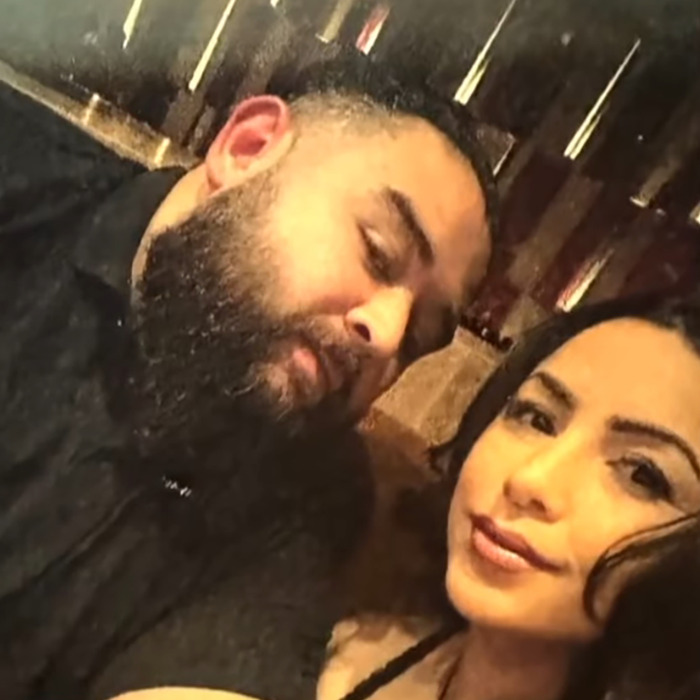 Man and woman taking a close selfie, related to cruise passenger body incident and fatal drinks served on board. Man and woman taking a close selfie, related to cruise passenger body incident and fatal drinks served on board.