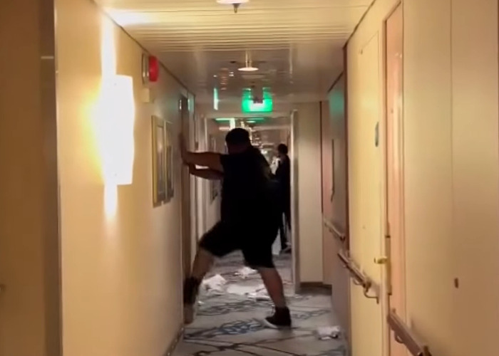 Man in dark clothing stumbling in narrow cruise ship hallway with scattered papers on the floor, cruise passenger incident scene. Man in dark clothing stumbling in narrow cruise ship hallway with scattered papers on the floor, cruise passenger incident scene.