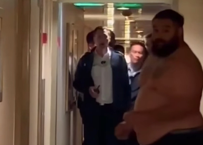 Cruise passenger's body inside a fridge after being fatally served 33 drinks shown in a crowded ship hallway. Cruise passenger's body inside a fridge after being fatally served 33 drinks shown in a crowded ship hallway.