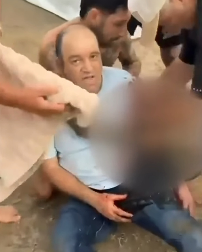 Man injured on Bondi Beach being helped by others after confronting attacker in a heartbreaking update. Man injured on Bondi Beach being helped by others after confronting attacker in a heartbreaking update.