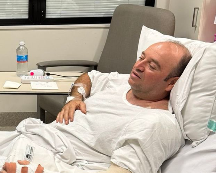 Man lying in hospital bed receiving treatment after Bondi Beach confrontation with attacker, as lawyer reveals update. Man lying in hospital bed receiving treatment after Bondi Beach confrontation with attacker, as lawyer reveals update.