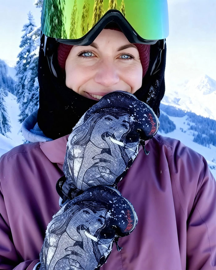 Smiling woman wearing ski goggles and gloves on snowy Austrian mountain, linked to boyfriend who abandoned her. Smiling woman wearing ski goggles and gloves on snowy Austrian mountain, linked to boyfriend who abandoned her.