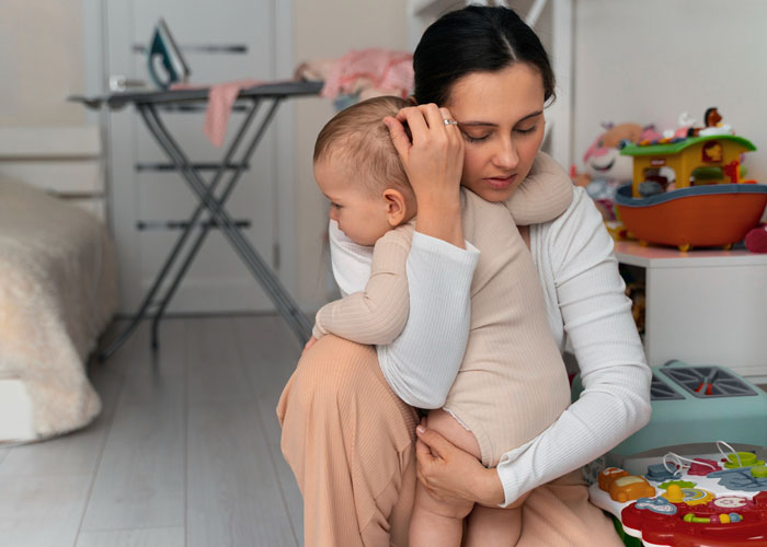 Woman comforting child in a home setting, highlighting custody court issues and family drama involving abandoned kid. Woman comforting child in a home setting, highlighting custody court issues and family drama involving abandoned kid.