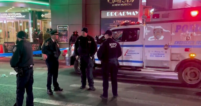 NYPD officers stand near an ambulance at a NYC street scene after a Marvelous Mrs. Maisel actress lost her life crossing the road. NYPD officers stand near an ambulance at a NYC street scene after a Marvelous Mrs. Maisel actress lost her life crossing the road.