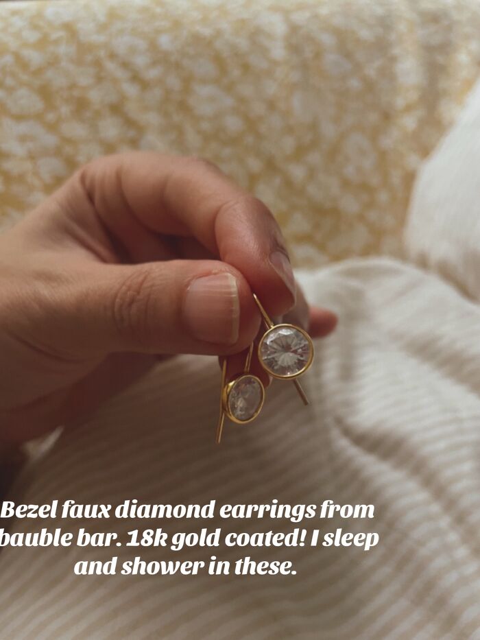 Hand holding bezel faux diamond earrings, showcasing popular Christmas gifts people can’t recommend more.