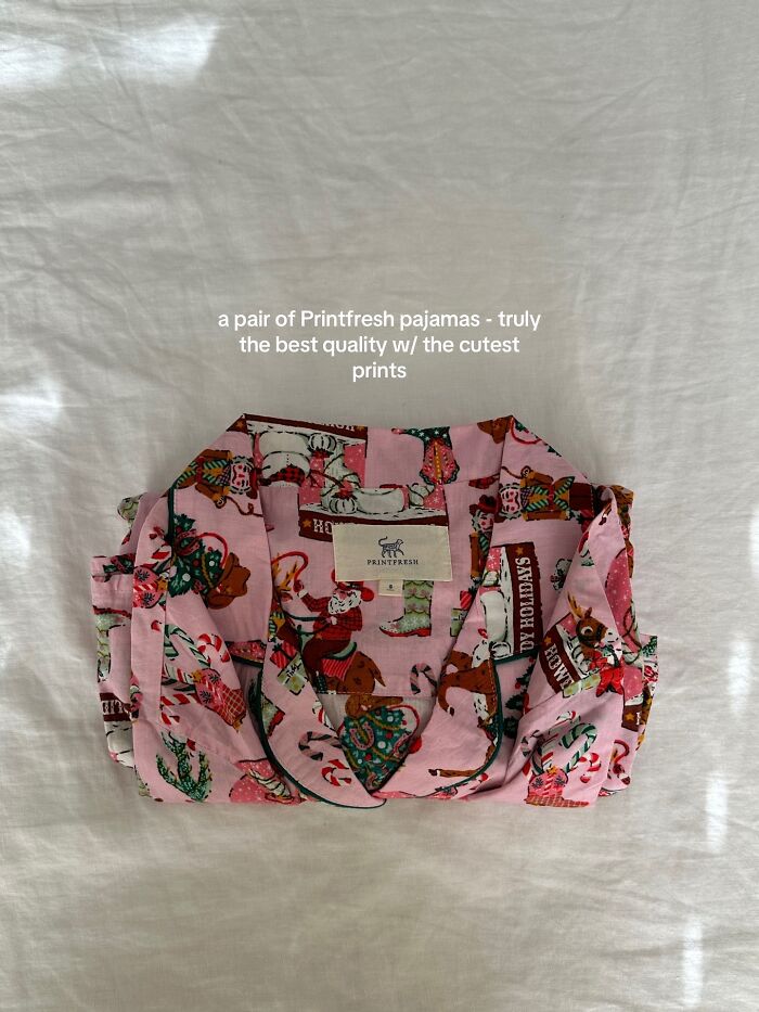 Folded Printfresh Christmas pajamas with festive prints, a highly recommended Christmas gift for comfort and quality.