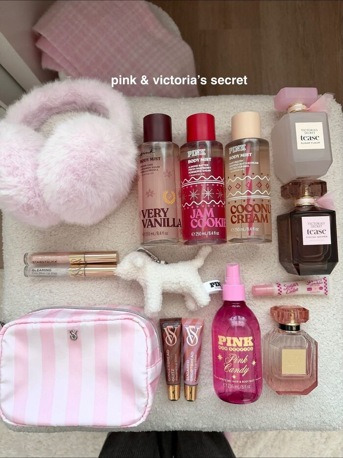 Collection of Victoria’s Secret body mists, perfumes, lip glosses, and accessories ideal as Christmas gifts people recommend highly.