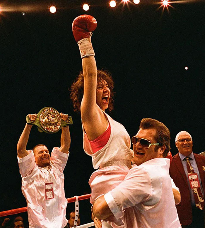 Sydney Sweeney celebrating a boxing win with team members in ring, fans spot odd detail on Sports Illustrated cover. Sydney Sweeney celebrating a boxing win with team members in ring, fans spot odd detail on Sports Illustrated cover.