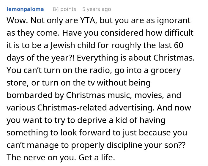 Screenshot of a Reddit comment criticizing a dad demanding family skip Hanukkah gifts because his son has tantrums.
