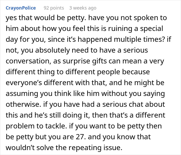 Comment discussing relationship advice about pressuring a girlfriend over a PS5 Christmas gift and handling surprise expectations.