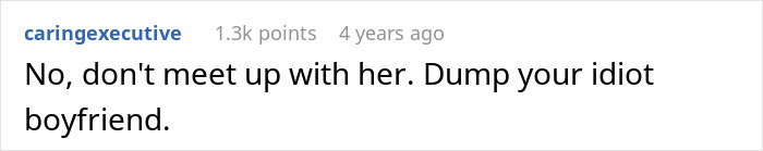 Screenshot of online comment saying dump your cheating boyfriend blaming her Cancer zodiac sign in a relationship dispute.