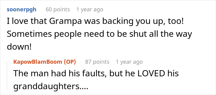 Red dog wearing a mil house Christmas outfit sitting near festive holiday decorations indoors. Red dog wearing a mil house Christmas outfit sitting near festive holiday decorations indoors.