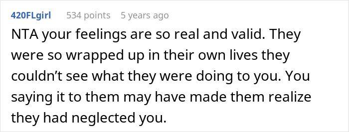 Screenshot of a Reddit comment discussing trauma caused by parents favoring their polyamorous partners over their child.