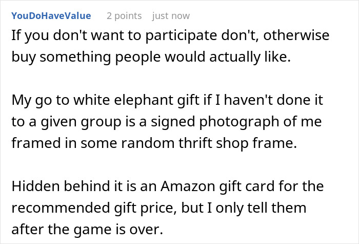 Screenshot of a Reddit comment describing a white elephant gift idea involving a signed photo and a hidden Amazon gift card.