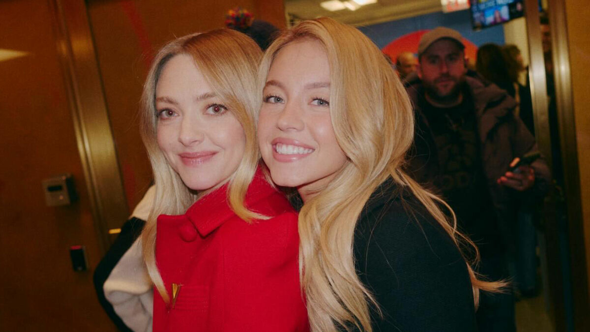 Two smiling women with long blonde hair posing closely indoors, related to Sydney Sweeney lie detector test controversy.