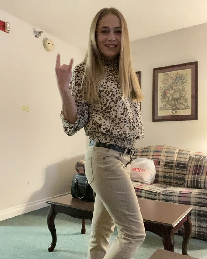 Young woman posing indoors in casual clothes, linked to racist Cinnabon worker viral tirade and criminal past reveal. Young woman posing indoors in casual clothes, linked to racist Cinnabon worker viral tirade and criminal past reveal.