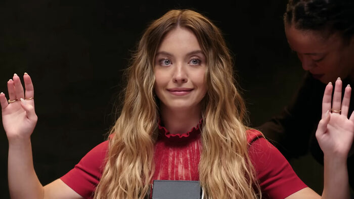 Sydney Sweeney raising hands during a lie detector test, caught in a lie causing public backlash online. Sydney Sweeney raising hands during a lie detector test, caught in a lie causing public backlash online.