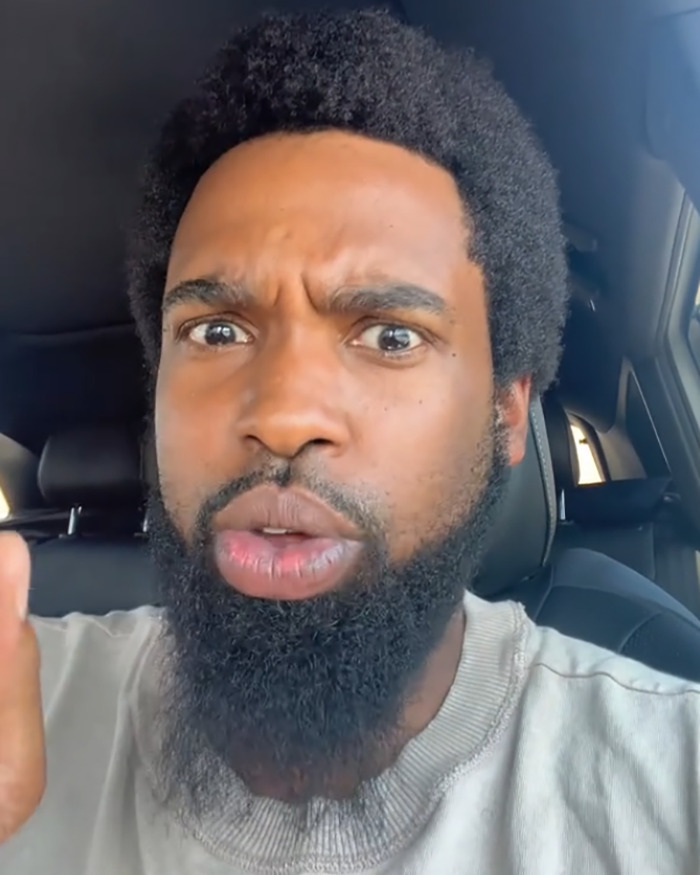 Man with a beard inside a car sharing a sad health update and explaining why he is on the streets, dad of Nickelodeon star. Man with a beard inside a car sharing a sad health update and explaining why he is on the streets, dad of Nickelodeon star.