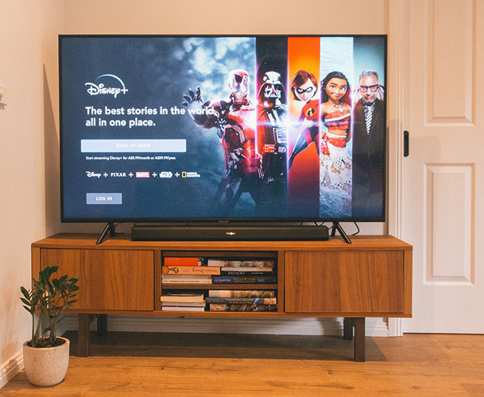 Disney streaming service displaying Marvel, Pixar, and Disney characters, highlighting what happened to Disney remakes debate. Disney streaming service displaying Marvel, Pixar, and Disney characters, highlighting what happened to Disney remakes debate.