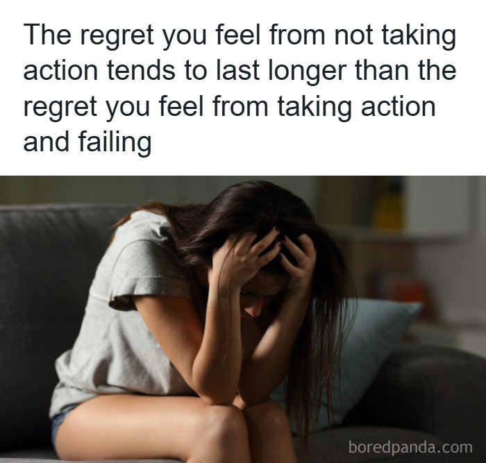 Woman sitting on a couch with her head in her hands, illustrating a psychology fact about regret and actions.