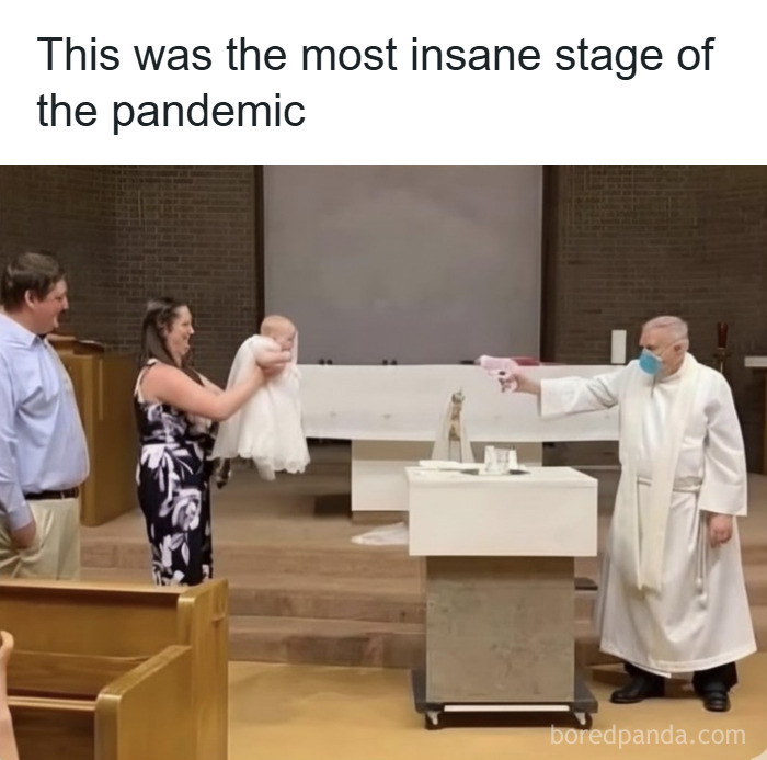 Family holding baby stretched out toward masked priest using a sanitizer spray during pandemic, funny meme from hilarious memes collection.