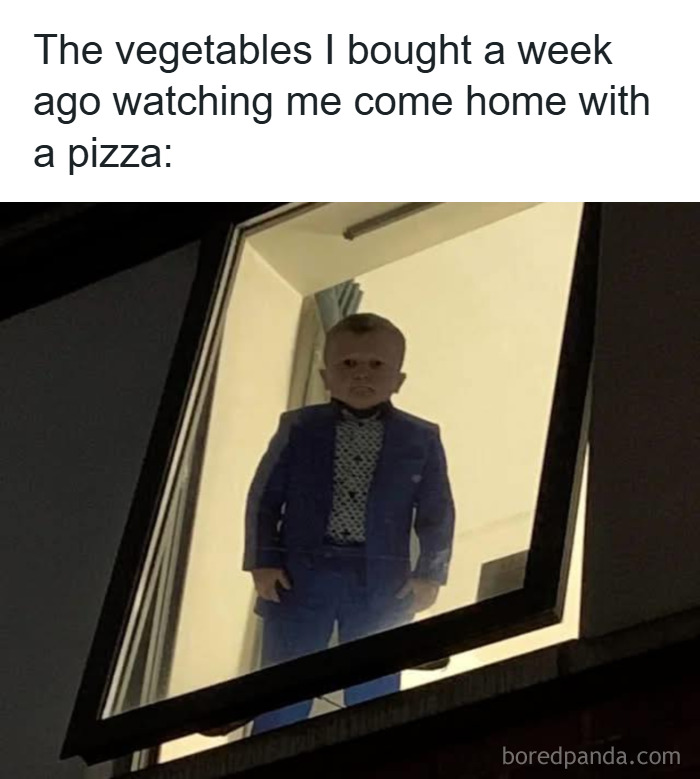 A funny meme showing a serious young boy in a suit staring from a window, representing stress relief memes.