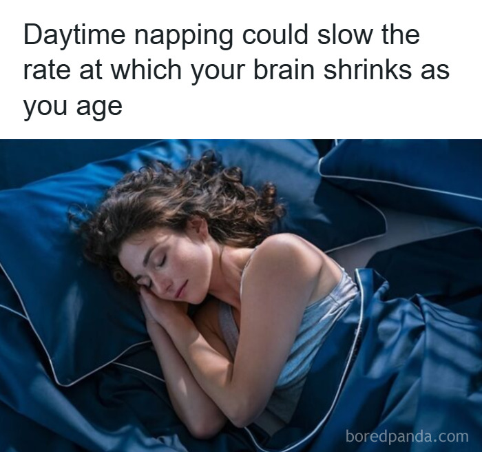 Woman napping peacefully in bed, illustrating a psychology fact about brain health and aging benefits of daytime naps.