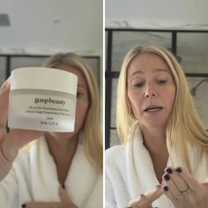 Gwyneth Paltrow applying goop beauty face cream in a white robe while sharing skincare routine at home.