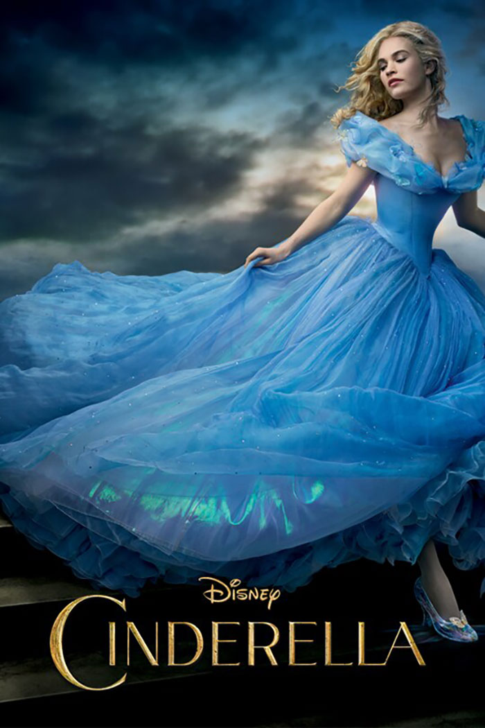 Cinderella in a flowing blue gown, representing Disney remakes and discussions on soulless adaptations and racism. Cinderella in a flowing blue gown, representing Disney remakes and discussions on soulless adaptations and racism.
