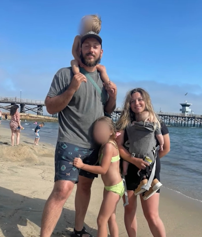 Family at the beach with children sharing heartbreaking words after dad's disturbing behavior on mountain revealed.
